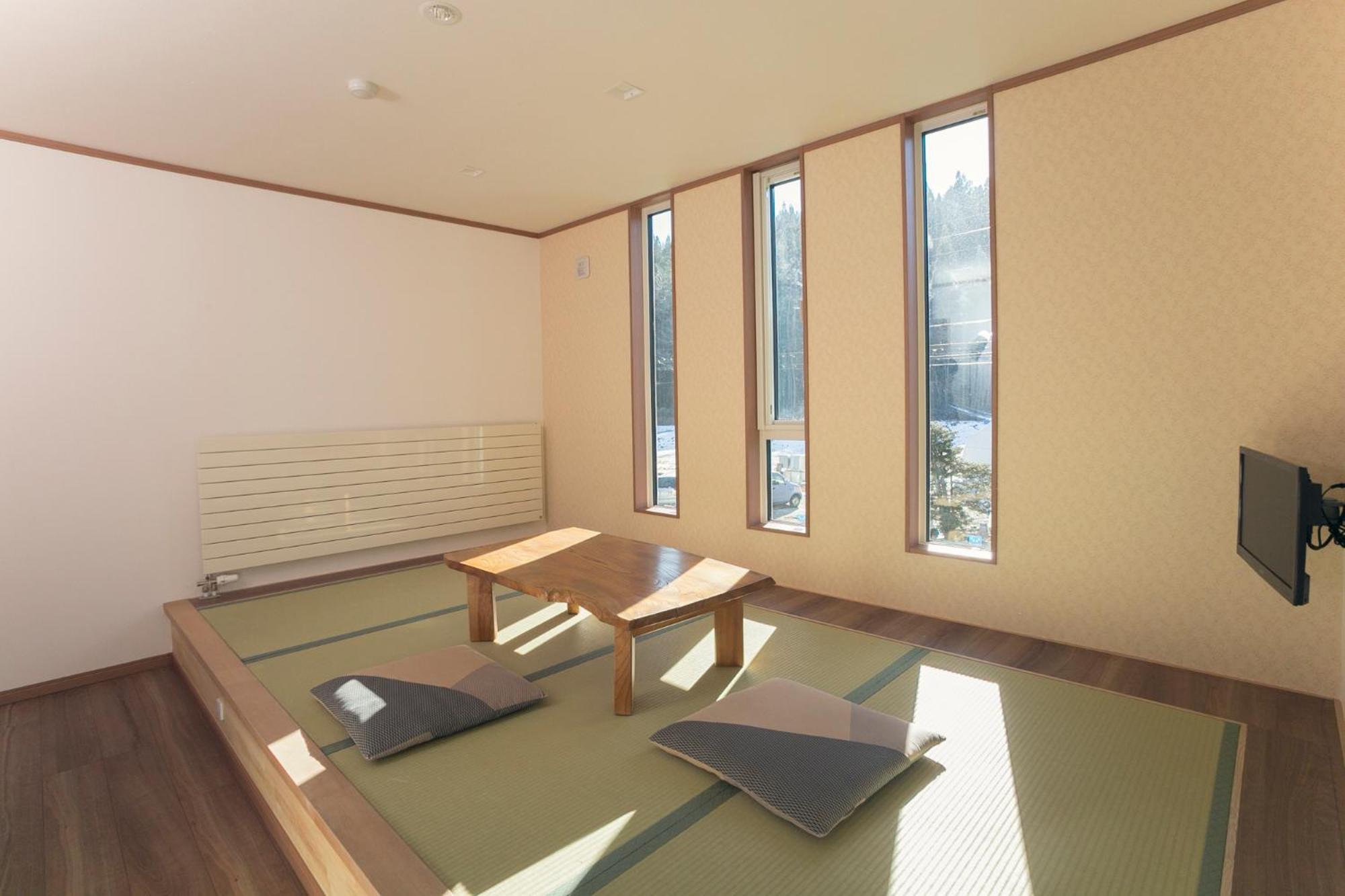 Ryokan Mokuzin Хакуба-Мура Номер фото